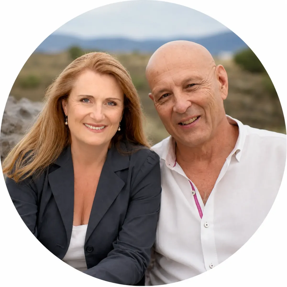 Allegra Huston and James Navé Smiling couple outdoors in a circular portrait with a rocky landscape in the background, woman on left and man on right.
